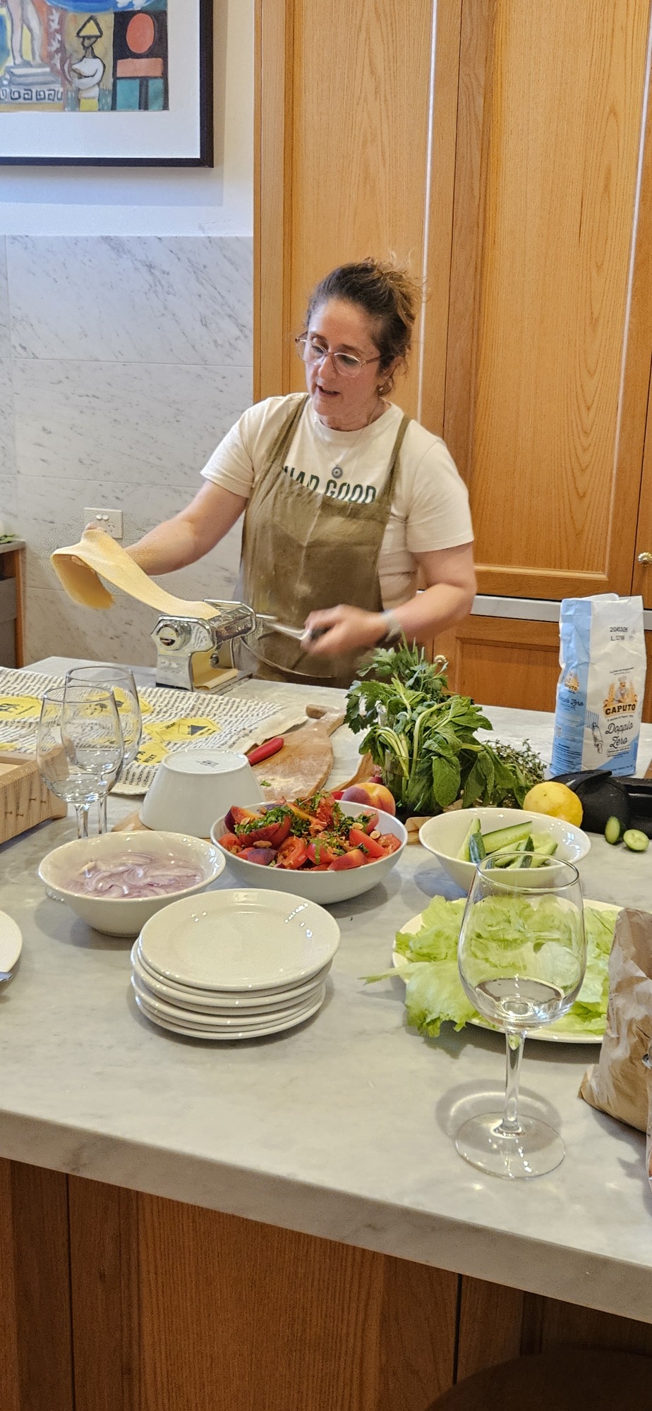 Angela cooking in the tour kitchen