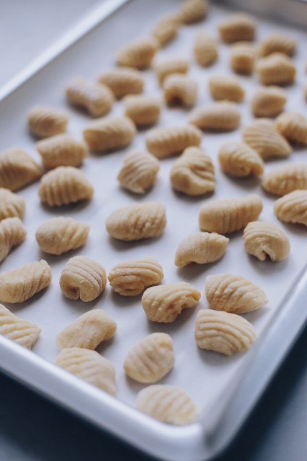 Ridged gnocchi resting on a tray