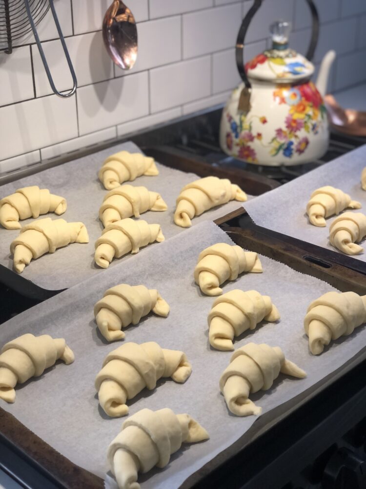 Cornetti shaped and proving, ready for the oven